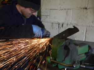 Sharpening a mower cutting blade