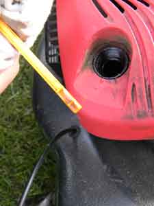 The correct level for oil in your mower