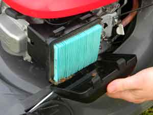 An example of a  paper air filter in a lawnmower engine